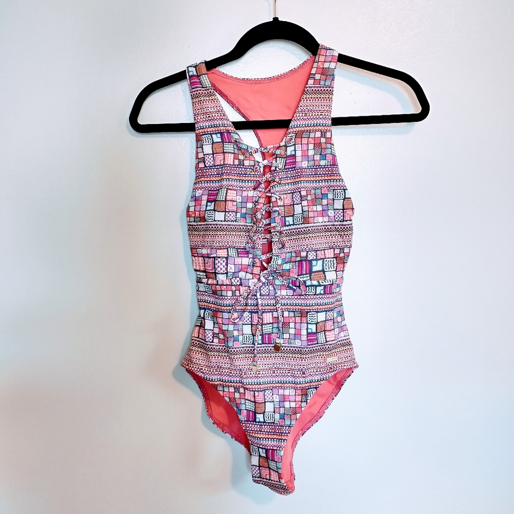Sunseeker one piece swimsuit. Front lace up detail and geometric pattern. US siz